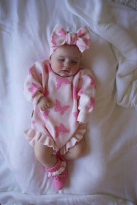 Flutter & Frills Knit Romper